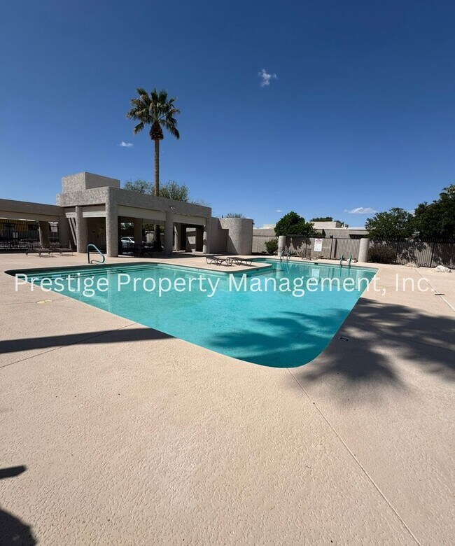 Building Photo - Totaling 3/3 With The Guest House; This Lovely Central Townhome is Everything You Need!