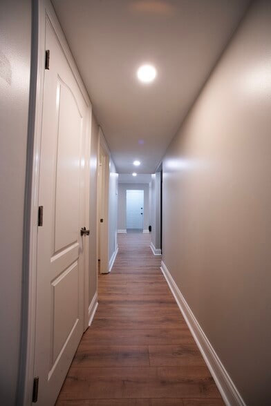 Main hallway view from Bedrooms to Entry - 1101 Old Hammond Chase