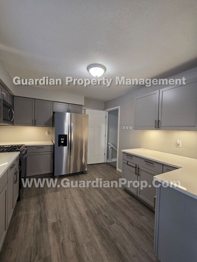 Building Photo - Available now! House with LVP flooring, Walk Out Patio, fenced yard, 2 car attached garage