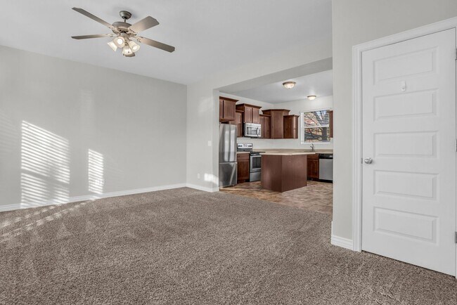 Building Photo - Spacious 4BR End-Unit Townhome | Low-Maintenance HOA Living