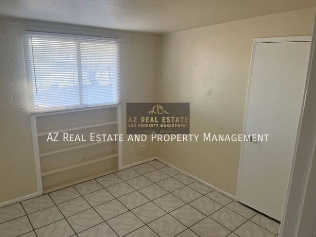 Building Photo - 3841 N 63rd Dr
