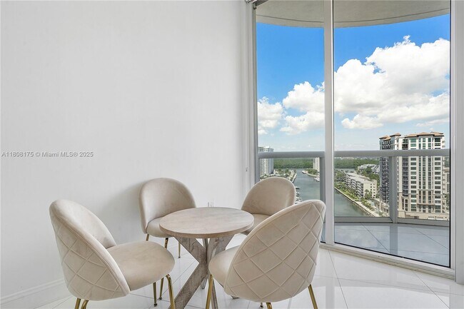 Building Photo - 15811 Collins Ave