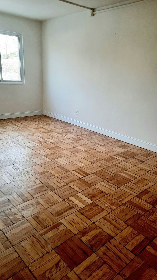 Building Photo - NOW LEASING AT BUNKER HILL FLATS!