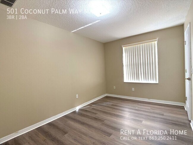 Building Photo - 501 Coconut Palm Way
