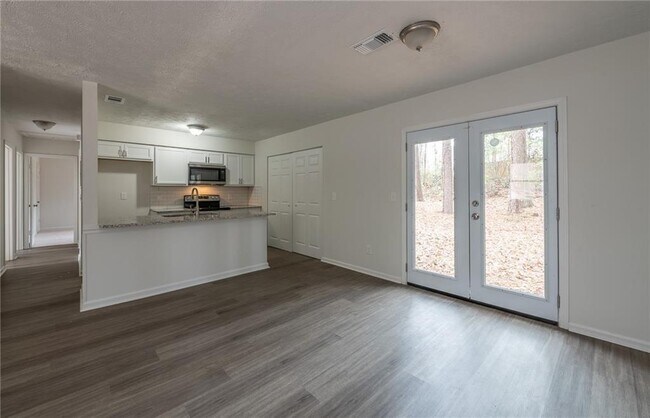 Building Photo - 9250 Woodgreen Way
