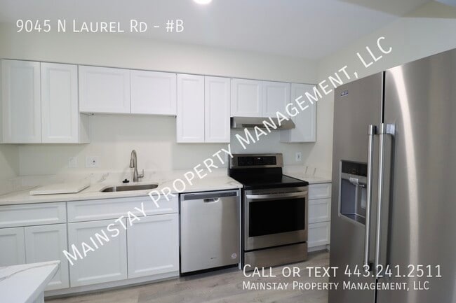 Building Photo - 9045 N Laurel Rd