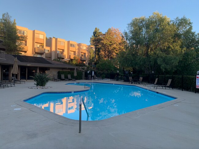 Building Photo - Penthouse 2 Bedroom/2 Bathroom Condo with Amazing Views of Adjacent Lake Murray & Mission Trails ...