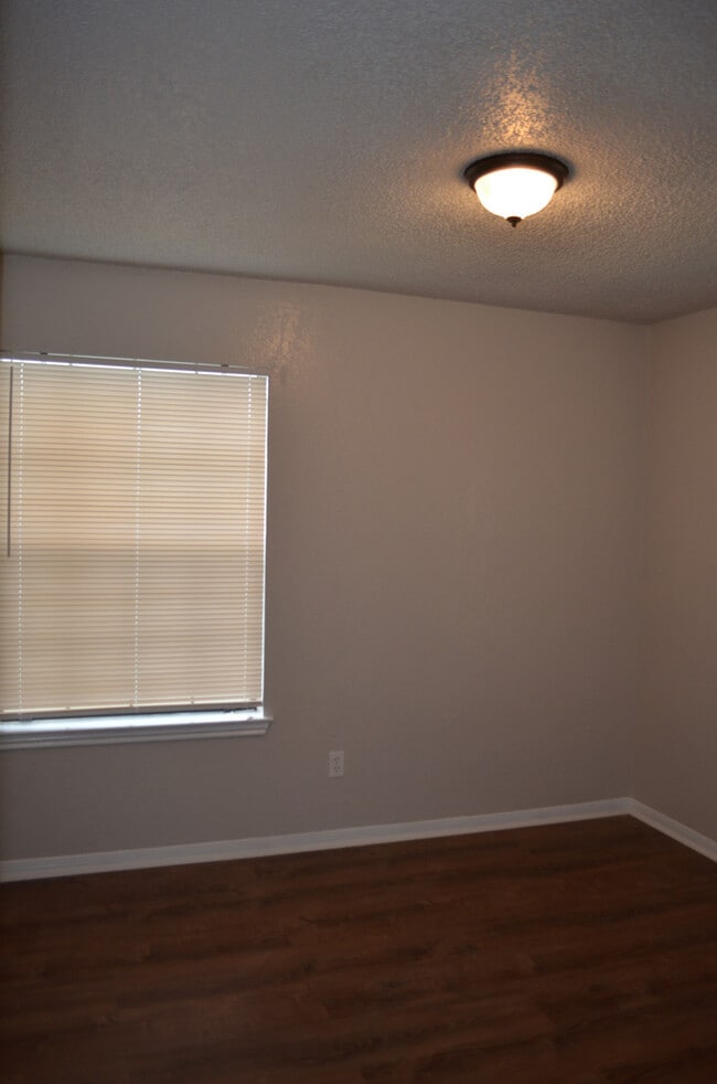 Building Photo - This 3 Bedroom Home with Fireplace is a must see!