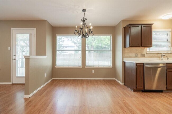 Building Photo - No Carpet! Tons of Space! Beautiful backya...