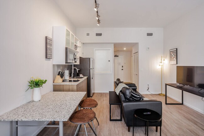 Building Photo - 9-JAN-JAN E 4th St