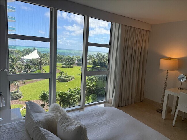 Building Photo - 10275 Collins Ave