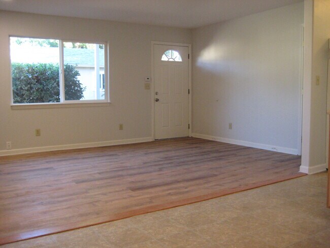 Living room with new, super-durable, plank floors are easy to keep clean. No vacuum cleaner required - 567 San Geronimo Valley Dr