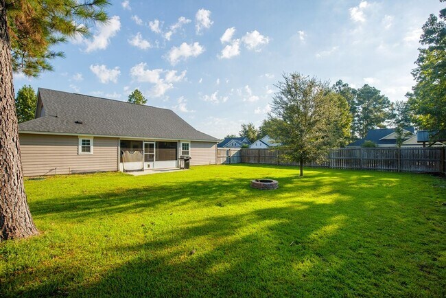 Building Photo - Modern 4-Bedroom Home with Screened Porch ...