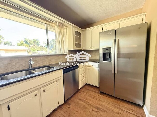 Building Photo - Spacious Corner-Lot Home with Cozy Charm a...