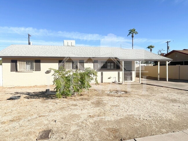 Building Photo - 410 E Desert Dr