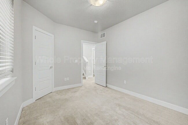 Building Photo - 9985 E 59th Ave