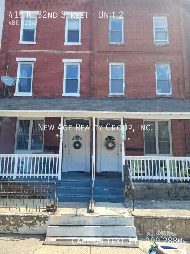 Building Photo - Spacious, Bi-level Apartment Available at ...