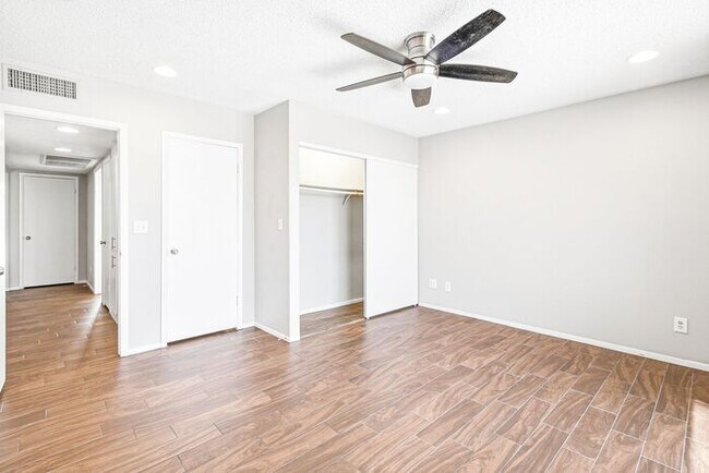 Building Photo - Gated 3-Bedroom Townhome with Fireplace, Patio & 2-Car Garage