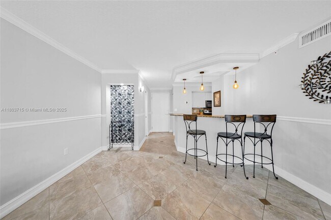Building Photo - 6917 Collins Ave