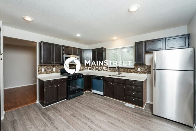 Building Photo - 4 Bedroom Pet-Friendly Home in Aurora, CO with Main Street Renewal