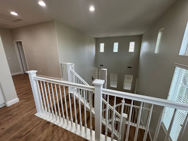 Building Photo - Spacious 4-Bedroom Home with Downstairs Bed/Bath & Full Community Access in Valencia!