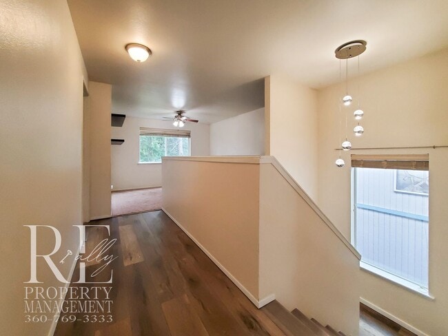 Building Photo - Modernized Two-Story with Open Layout, Gas Fireplace & Large Fenced Yard