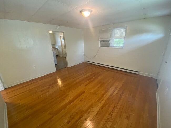 Building Photo - Private carport, in-unit laundry, and the Lakewood strip right outside your door.