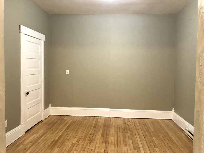 bedroom with large closet and hardwood floors - 108 King St