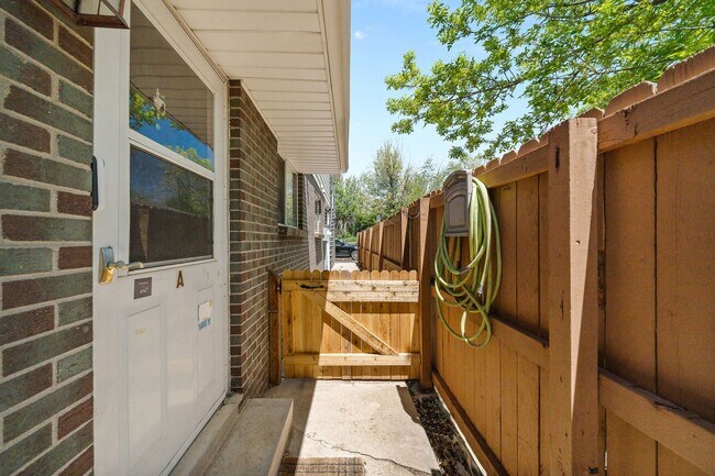 Building Photo - Recently Updated 2BA, 1.5BA Condo with Fen...