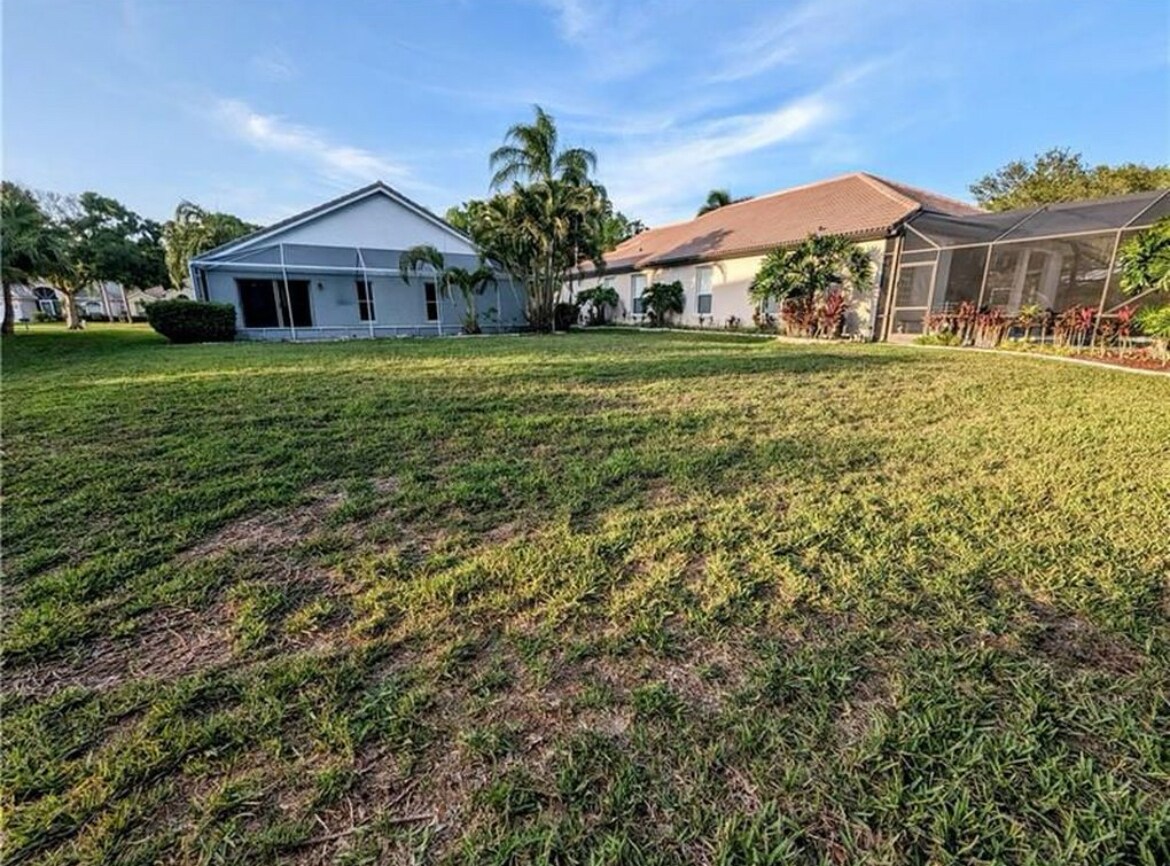 View of home from the ba k yard looking towards home - 562 SW Saint Martins Cv