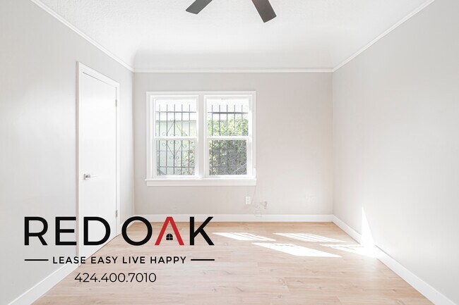 Building Photo - 1623 W 39th Pl