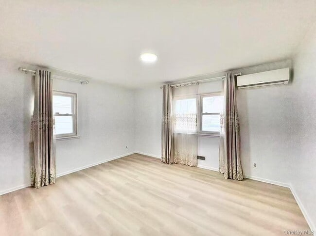 Building Photo - 23-47 128th St