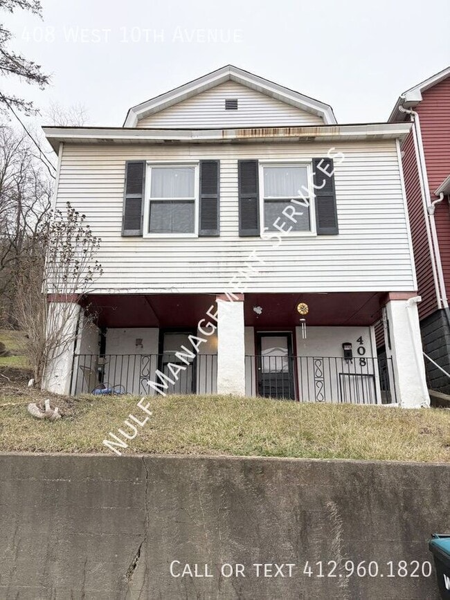 Building Photo - 408 W 10th Ave