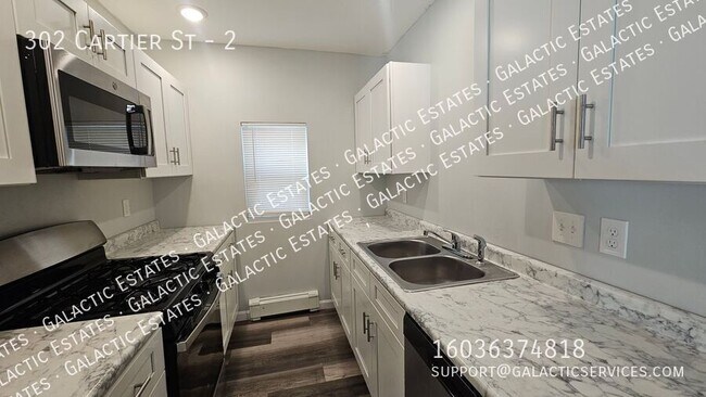 Building Photo - 302 Cartier St