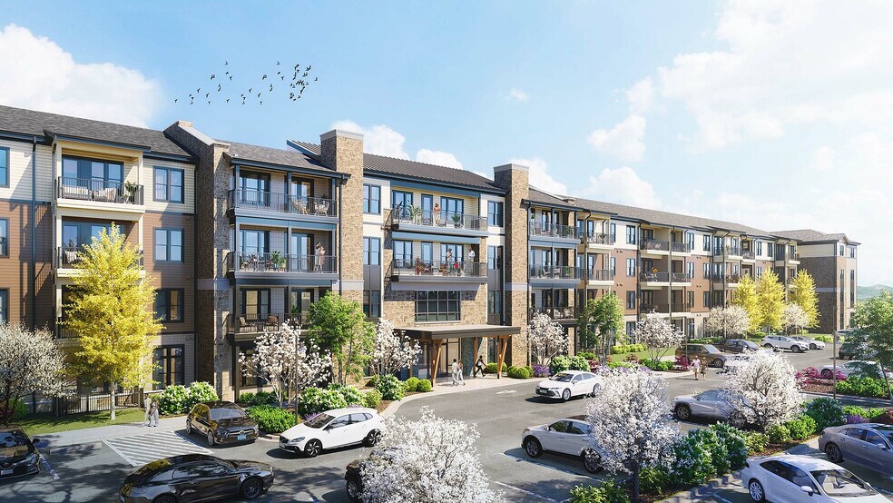 Chorus at Asheville exterior and parking - Chorus Asheville 55+ Active Adult Apartment Homes