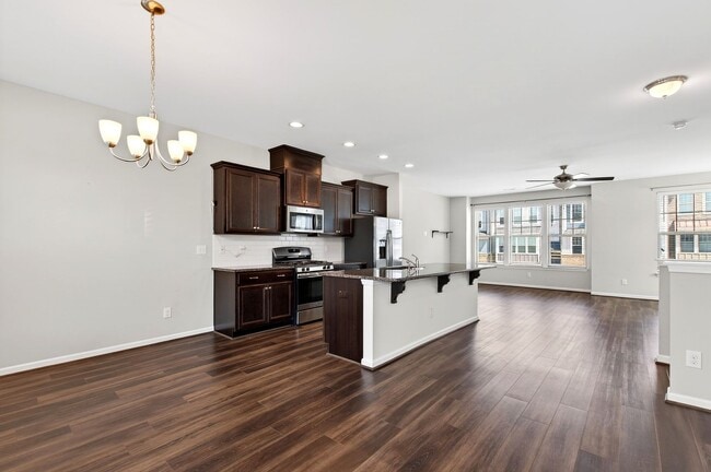 Building Photo - ***Pending*** Beautiful 4BR End-Unit Townhome in Prime Apex Location!