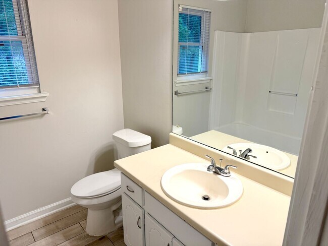 Building Photo - Welcome to this stylish and contemporary 2-bedroom, 1.5-bathroom corner townhome in Stockbridge!