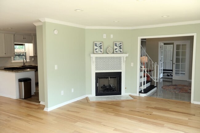 Building Photo - This distinguished five-bedroom, three-bathroom residence offers an exceptional combination of re...