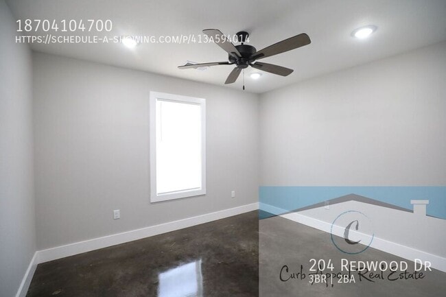 Building Photo - 204 Redwood Dr