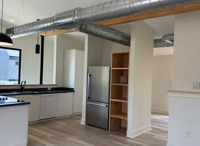 Building Photo - Vaulted Ceilings & Hardwood Floors in This Charming Indianapolis L