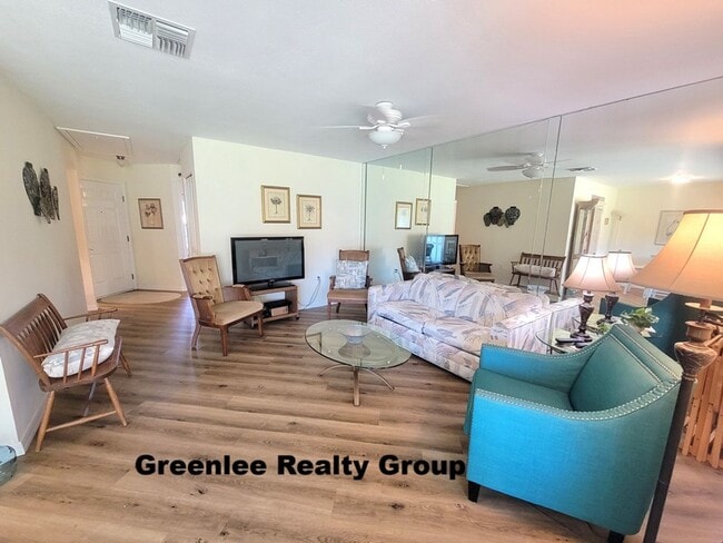 Building Photo - Fully furnished waterfront 55+ rental with beautiful updates, great amenities, and all utilities ...