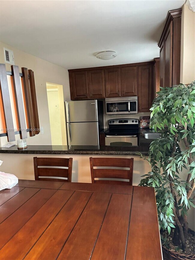 Building Photo - 3048 Sunrise Lakes Dr E