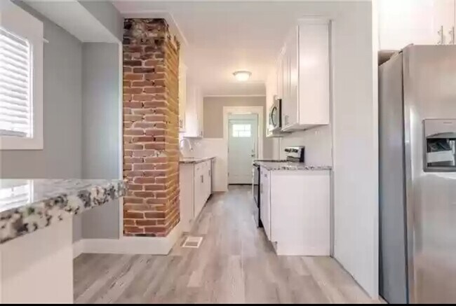 Building Photo - 5519 Highland Ave