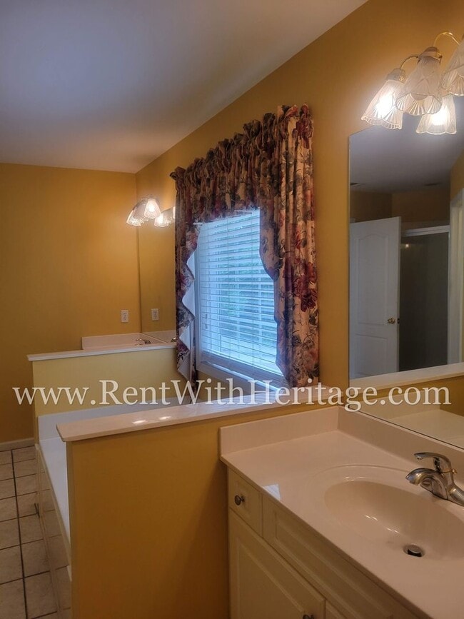 Building Photo - Gorgeous 3-Story Brick Home / 2 Fireplaces / Full Finished Basement / Chapel Hill Schools