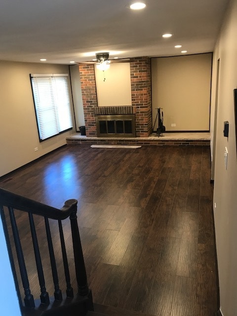 Lower level family room and fire place. All lights in this room are LED and dimmable. - 512 Carlyle Ln