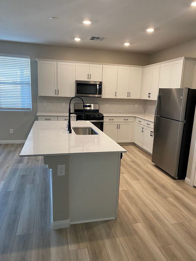 Building Photo - Americana Property Mgmt - 2022 built 4 bedrooms in prime South West Las Vegas