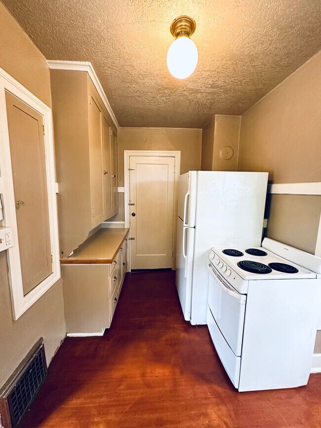 Building Photo - 1000-1003 W 25th Ave