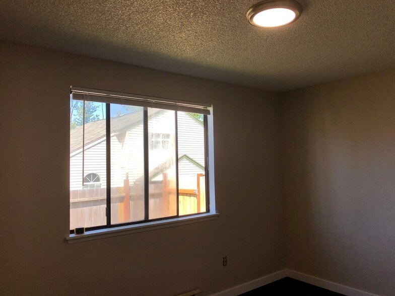 1st bedroom has lots a of natural might with view to backyard - 219 E 36th St