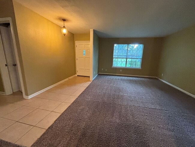 Building Photo - Corner lot in Southern Hills... Lawn included with rent.