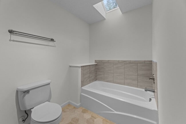 Building Photo - Live Where Others Vacation | Gated Community + Marina Access
